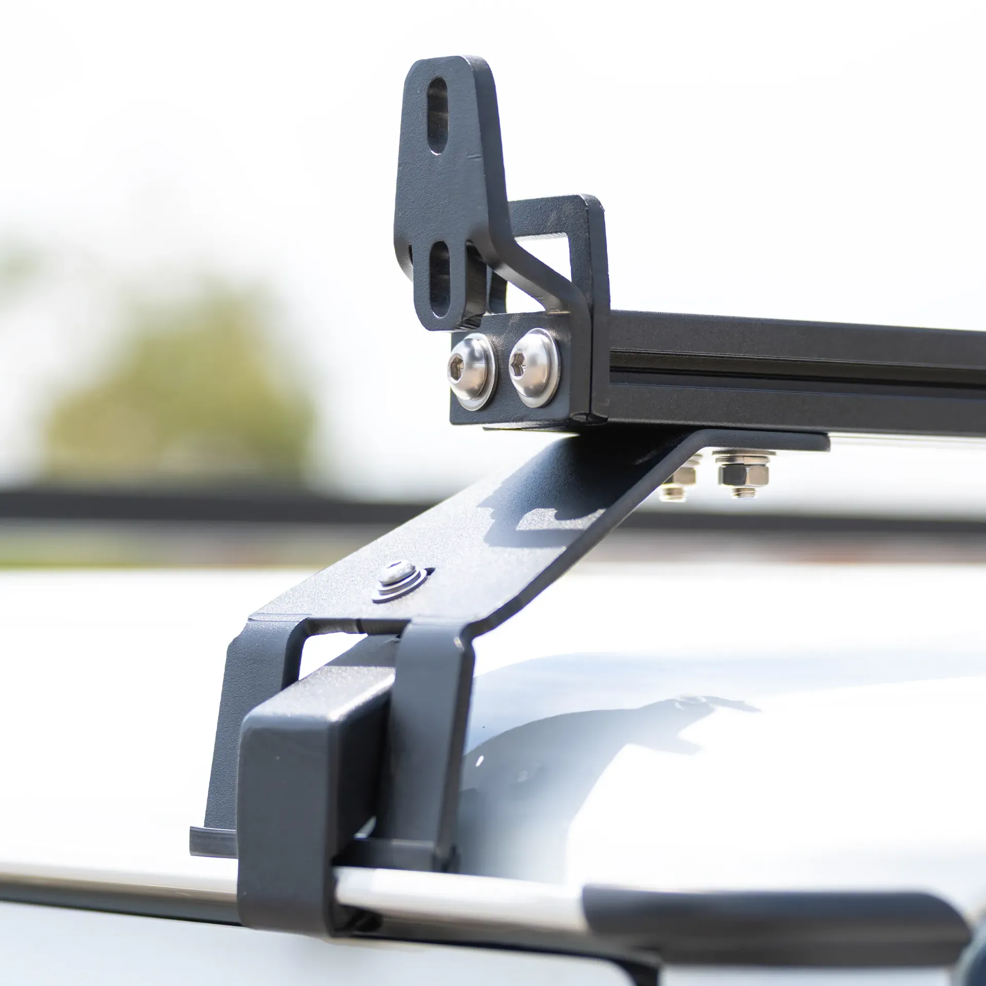 Par de Soportes para Toldo Lateral en Barras de Carga - Suzuki Jimny